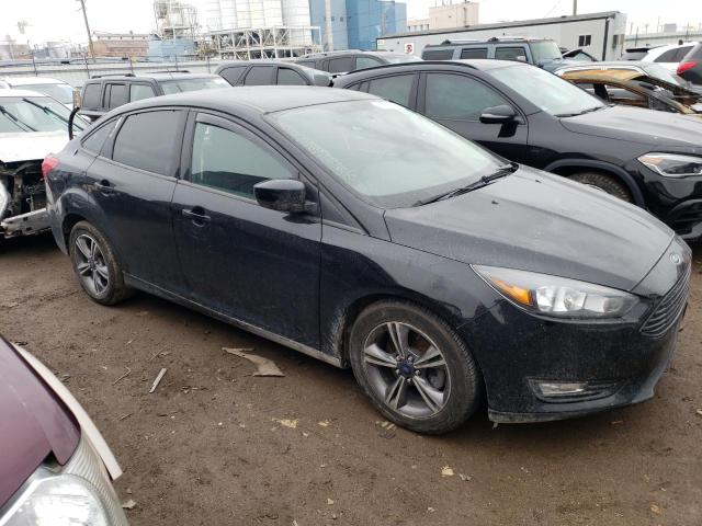 Photo 4 from auction – 2018 FORD FOCUS SE with VIN 1FADP3FE2JL202619