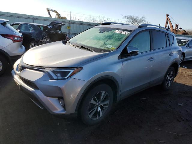 TOYOTA RAV4 XLE 2017 with VIN 2T3RFREV7HW677116 - Photo from auction