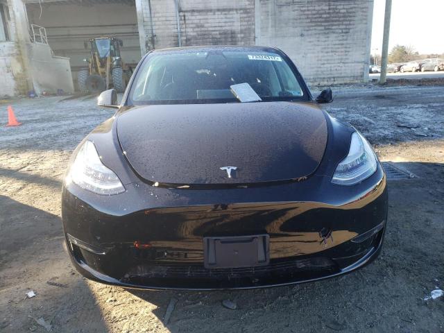 Photo 5 from auction – 2021 TESLA MODEL Y with VIN 5YJYGAEE5MF112597