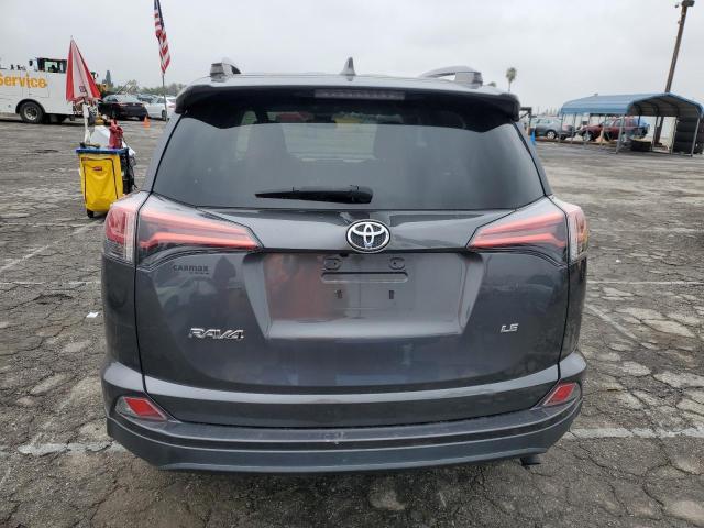 Photo 6 from auction – 2018 TOYOTA RAV4 LE with VIN 2T3ZFREV7JW505724