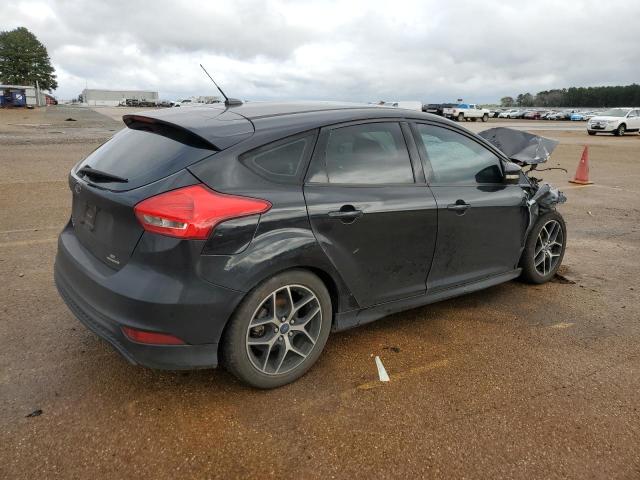 Photo 3 from auction – 2015 FORD FOCUS SE with VIN 1FADP3K24FL210319