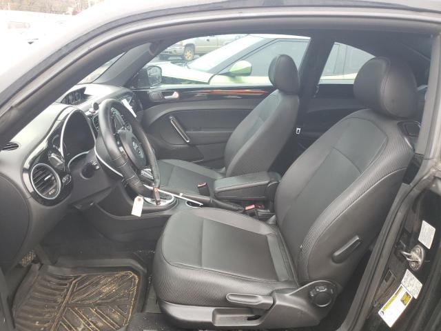 Photo 7 from auction – 2014 VOLKSWAGEN BEETLE with VIN 3VWJL7AT9EM658995