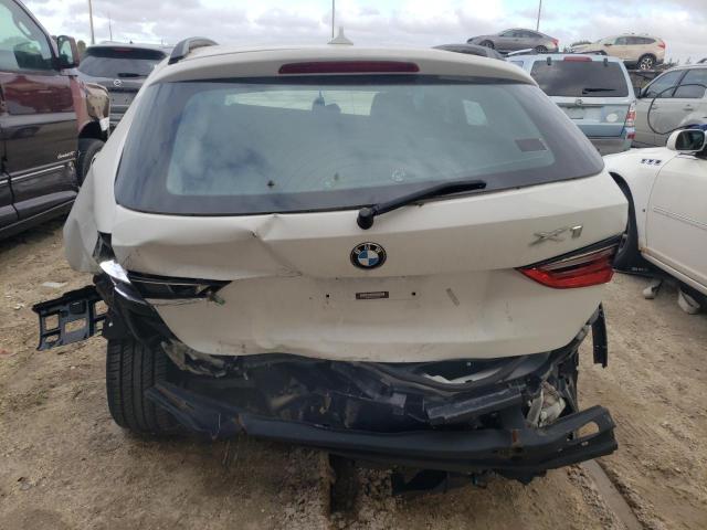 Photo 6 from auction – 2014 BMW X1 SDRIVE2 with VIN WBAVM1C54EVW47998