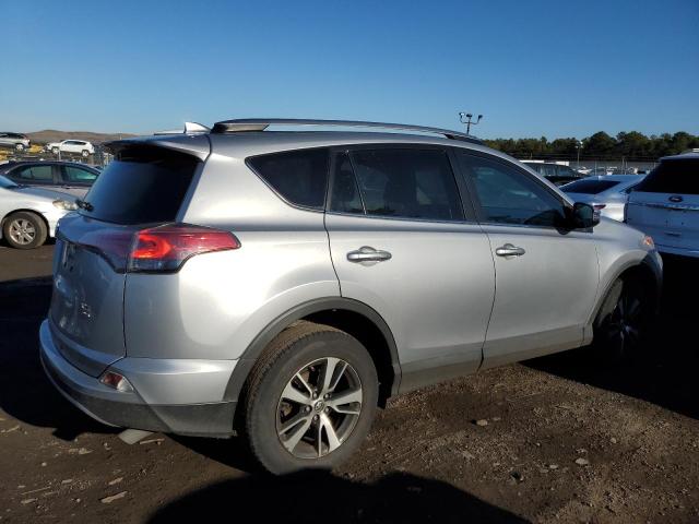 Photo 3 from auction – 2017 TOYOTA RAV4 XLE with VIN 2T3RFREV7HW677116