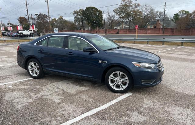FORD TAURUS SEL 2016 with VIN 1FAHP2E8XGG117309 - Photo from auction