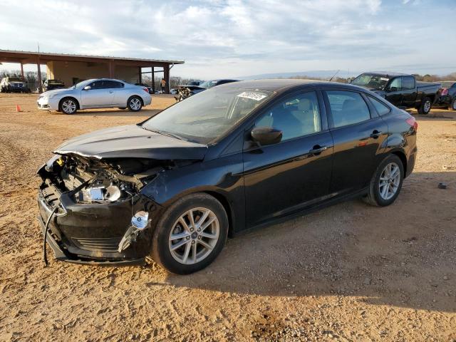FORD FOCUS SE 2018 with VIN 1FADP3FEXJL238168 - Photo from auction