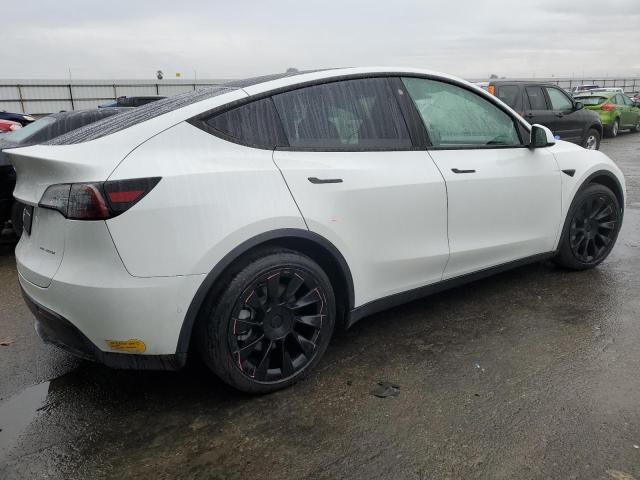 Photo 3 from auction – 2021 TESLA MODEL Y with VIN 5YJYGAEE3MF155027