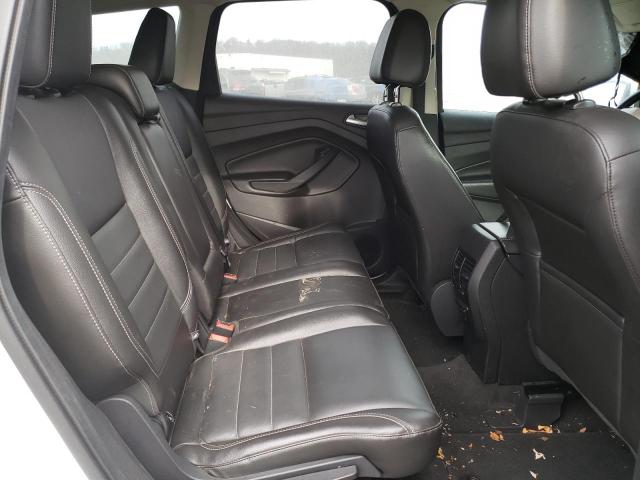 Photo 11 from auction – 2014 FORD ESCAPE TIT with VIN 1FMCU9JX8EUA26343