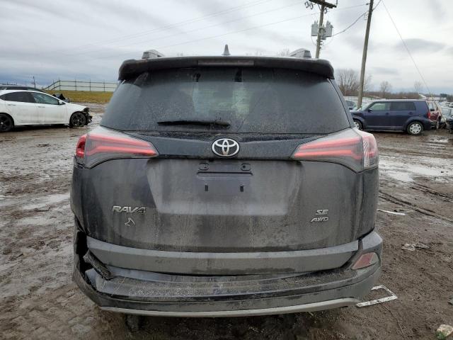 Photo 6 from auction – 2018 TOYOTA RAV4 SE with VIN JTMJFREVXJJ209690