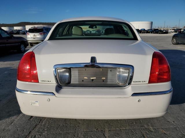 Photo 6 from auction – 2004 LINCOLN TOWN CAR E with VIN 1LNHM81W54Y659638