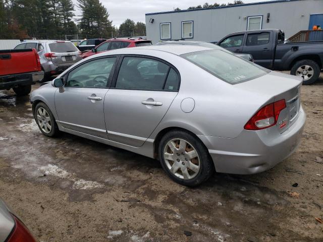 Photo 2 from auction – 2011 HONDA CIVIC LX with VIN 19XFA1F54BE032895