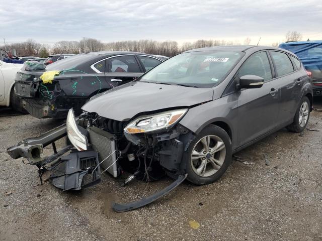 FORD FOCUS SE 2014 with VIN 1FADP3K25EL355075 - Photo from auction