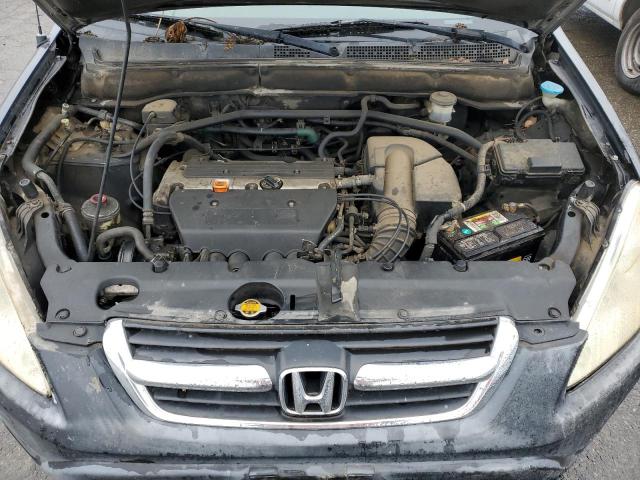 Photo 12 from auction – 2002 HONDA CR-V LX with VIN JHLRD68432C002173