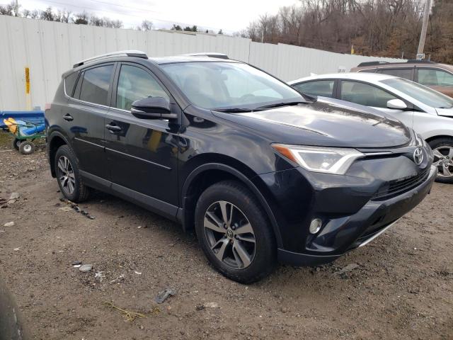 Photo 4 from auction – 2016 TOYOTA RAV4 XLE with VIN 2T3RFREV7GW415806