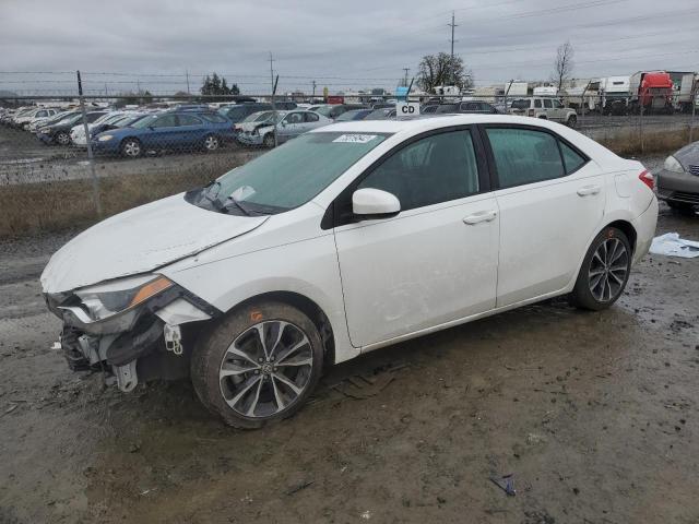 TOYOTA COROLLA L 2015 with VIN 2T1BURHE9FC322619 - Photo from auction