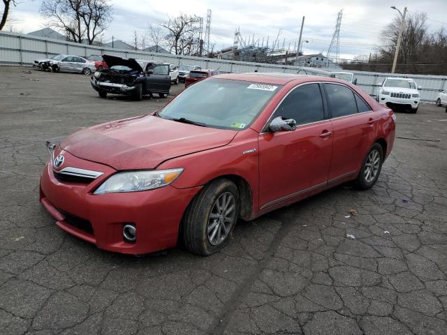 TOYOTA CAMRY HYBR 2011 with VIN 4T1BB3EK9BU142434 - Photo from auction