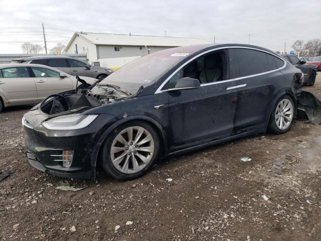 TESLA MODEL X 2017 with VIN 5YJXCDE2XHF060954 - Photo from auction