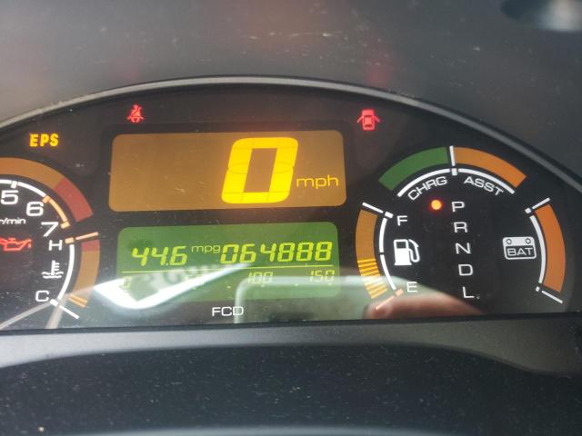 Photo 9 from auction – 2004 HONDA INSIGHT with VIN JHMZE14714T000324