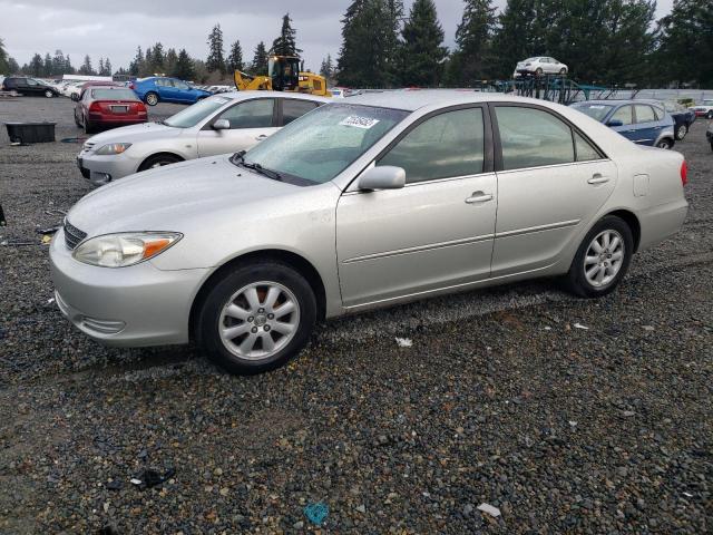 TOYOTA CAMRY LE 2002 with VIN JTDBF32K320064771 - Photo from auction