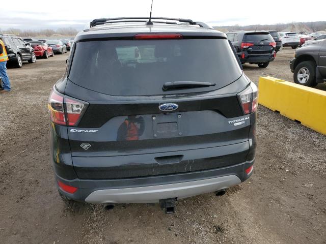 Photo 6 from auction – 2017 FORD ESCAPE TIT with VIN 1FMCU9J98HUB58167