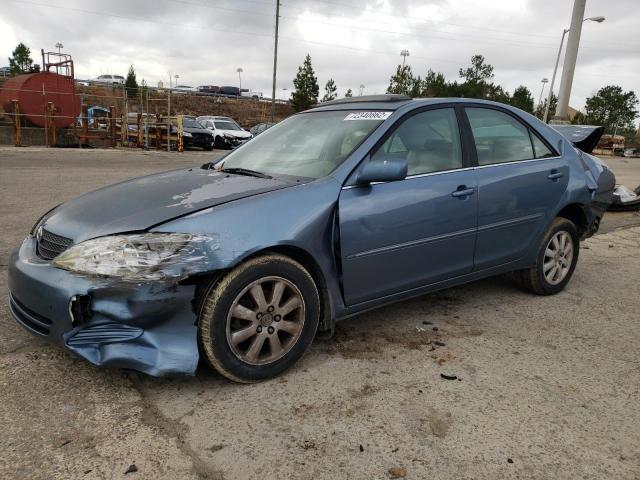 TOYOTA CAMRY LE 2002 with VIN 4T1BE32K32U598473 - Photo from auction