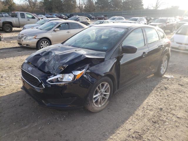 FORD FOCUS SE 2018 with VIN 1FADP3K21JL316137 - Photo from auction