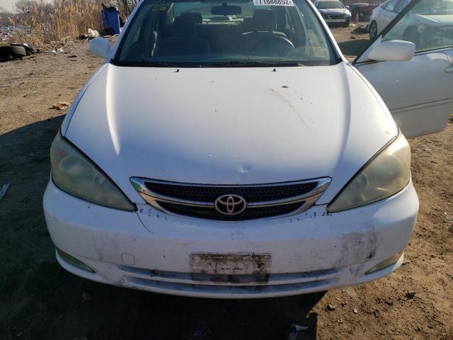 Photo 11 from auction – 2004 TOYOTA CAMRY LE with VIN JTDBE32K340245956