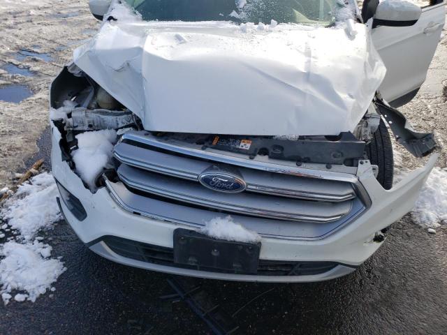 Photo 12 from auction – 2017 FORD ESCAPE SE with VIN 1FMCU9G99HUC03415