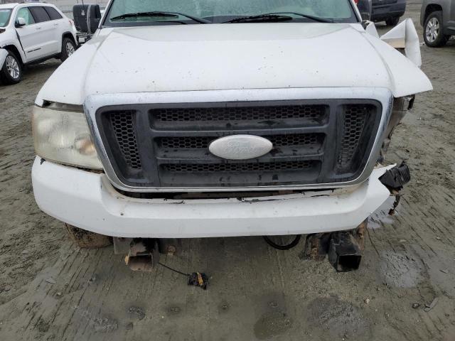 Photo 11 from auction – 2004 FORD F150 with VIN 1FTVX12544NB03365