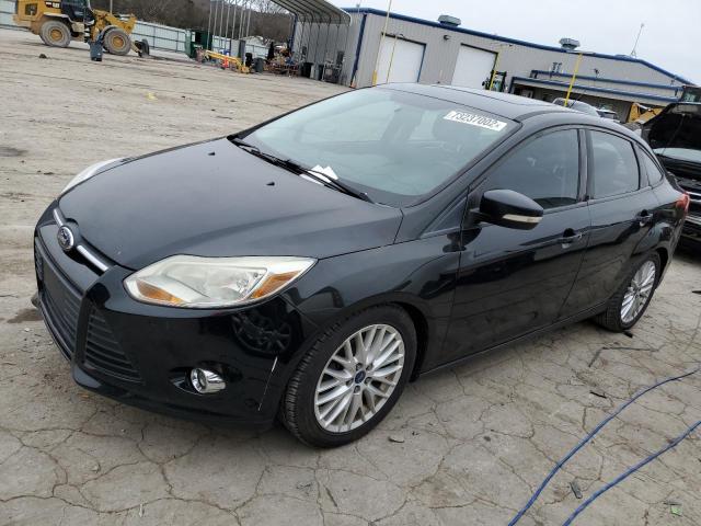 FORD FOCUS SE 2014 with VIN 1FADP3F23EL319069 - Photo from auction