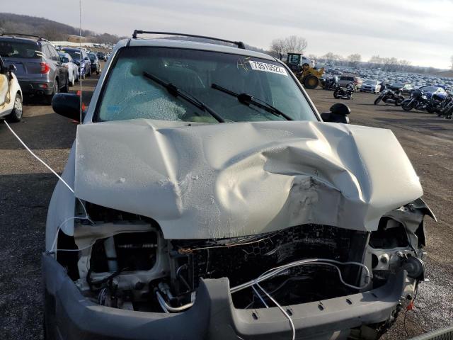 Photo 5 from auction – 2003 FORD ESCAPE XLT with VIN 1FMYU93103KD90747