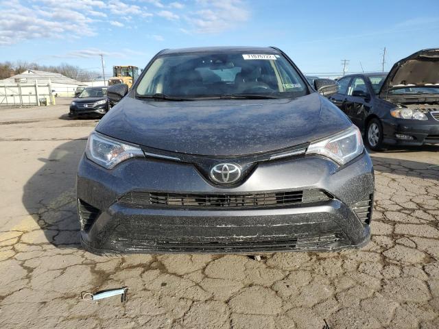 Photo 5 from auction – 2018 TOYOTA RAV4 LE with VIN JTMBFREV3JJ220048