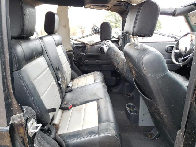 Photo 11 from auction – 2010 JEEP WRANGLER U with VIN 1J4BA5H16AL227557
