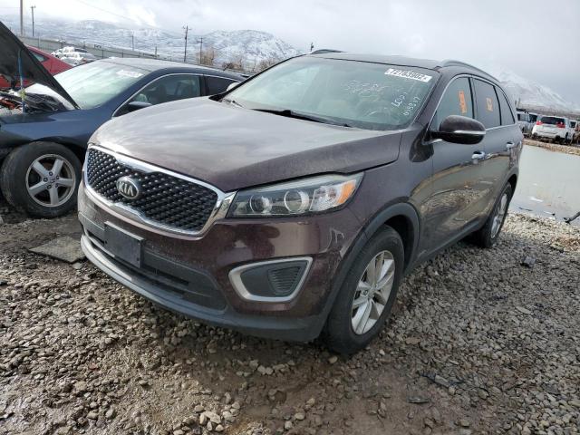 KIA SORENTO LX 2016 with VIN 5XYPGDA30GG048807 - Photo from auction