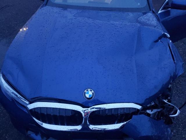 Photo 11 from auction – 2022 BMW 330XI with VIN 3MW5R7J02N8C37103
