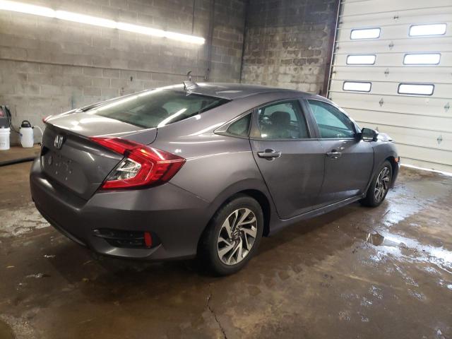 Photo 3 from auction – 2018 HONDA CIVIC EX with VIN 19XFC2F73JE203135
