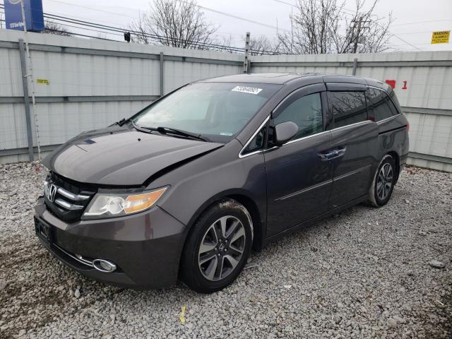 Photo 1 from auction – 2014 HONDA ODYSSEY TO with VIN 5FNRL5H95EB097512