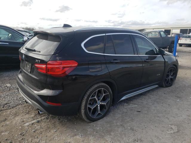 Photo 3 from auction – 2016 BMW X1 XDRIVE2 with VIN WBXHT3C3XG5E53126