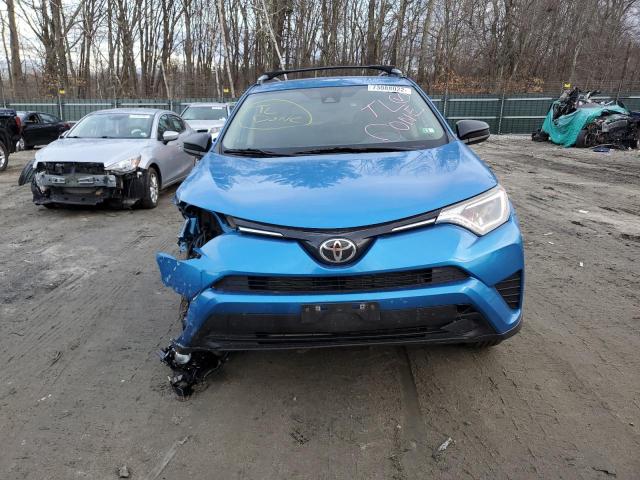 Photo 5 from auction – 2017 TOYOTA RAV4 LE with VIN JTMBFREV6HJ125557
