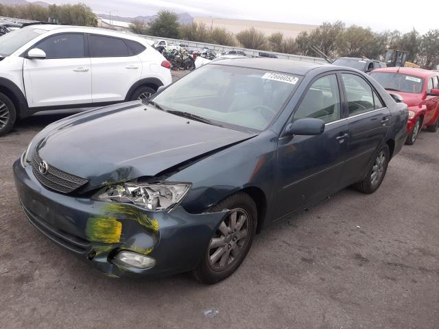 TOYOTA CAMRY LE 2004 with VIN 4T1BF32K14U071547 - Photo from auction