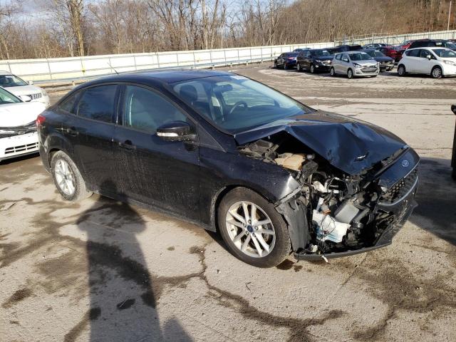 Photo 4 from auction – 2016 FORD FOCUS SE with VIN 1FADP3F22GL301228