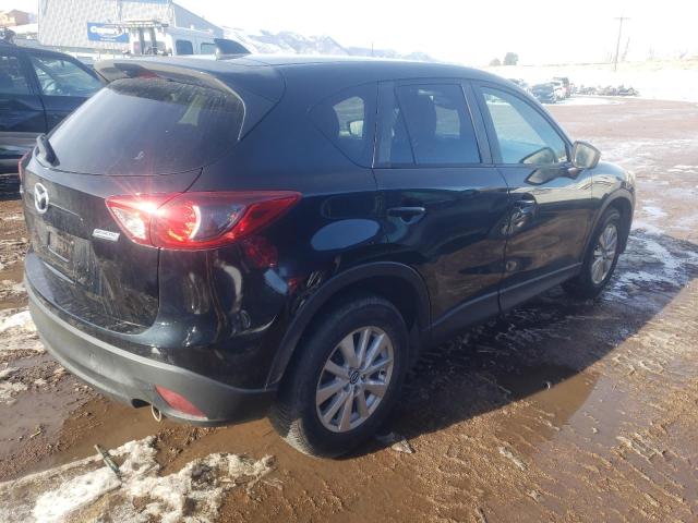 Photo 3 from auction – 2015 MAZDA CX-5 TOURI with VIN JM3KE2CY2F0481327