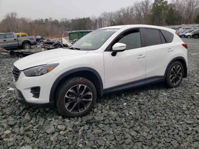 MAZDA CX-5 GT 2016 with VIN JM3KE2DY4G0694831 - Photo from auction