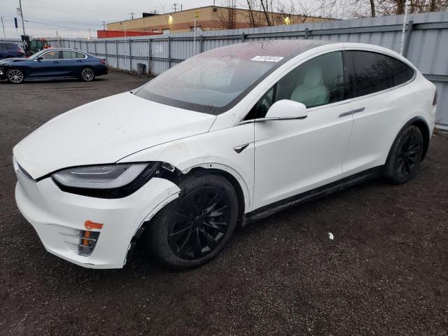 TESLA MODEL X 2017 with VIN 5YJXCBE2XHF035718 - Photo from auction