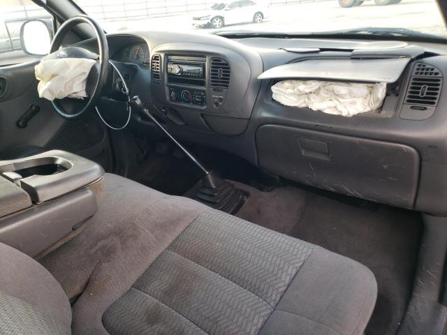 Photo 8 from auction – 2003 FORD F150 with VIN 1FTRF072X3KD79403