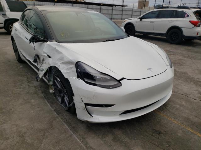 Photo 4 from auction – 2021 TESLA MODEL 3 with VIN 5YJ3E1EA8MF940558