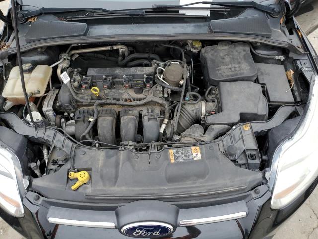 Photo 11 from auction – 2014 FORD FOCUS SE with VIN 1FADP3F23EL319069