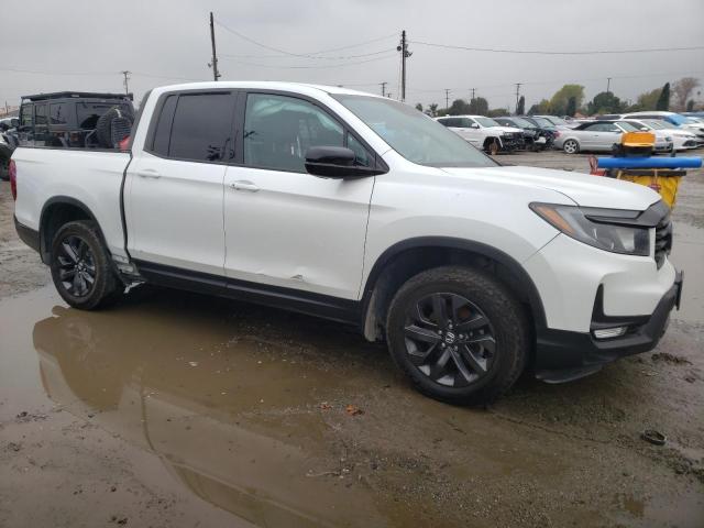 Photo 4 from auction – 2021 HONDA RIDGELINE with VIN 5FPYK3F13MB021891