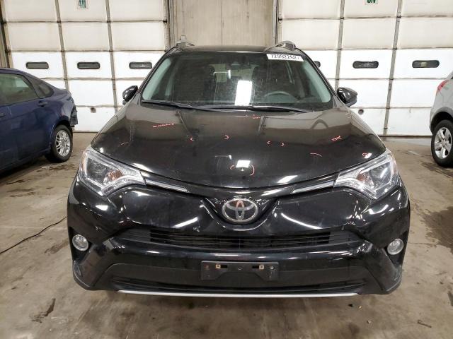 Photo 5 from auction – 2017 TOYOTA RAV4 XLE with VIN 2T3RFREV4HW594226