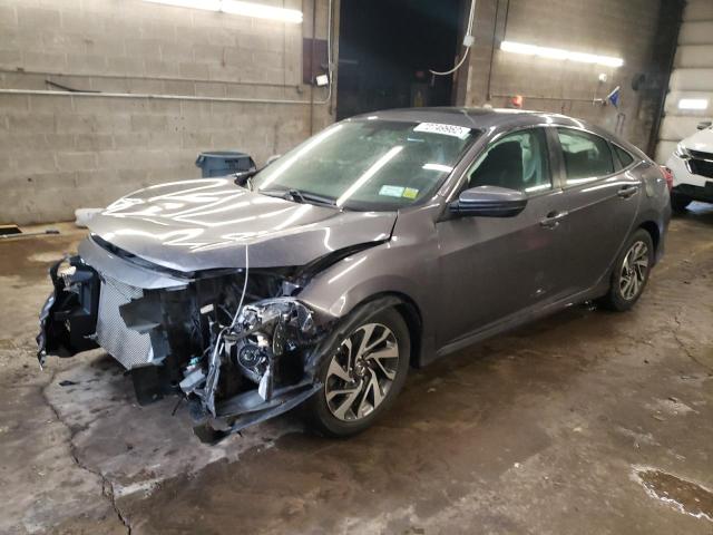 HONDA CIVIC EX 2018 with VIN 19XFC2F73JE203135 - Photo from auction